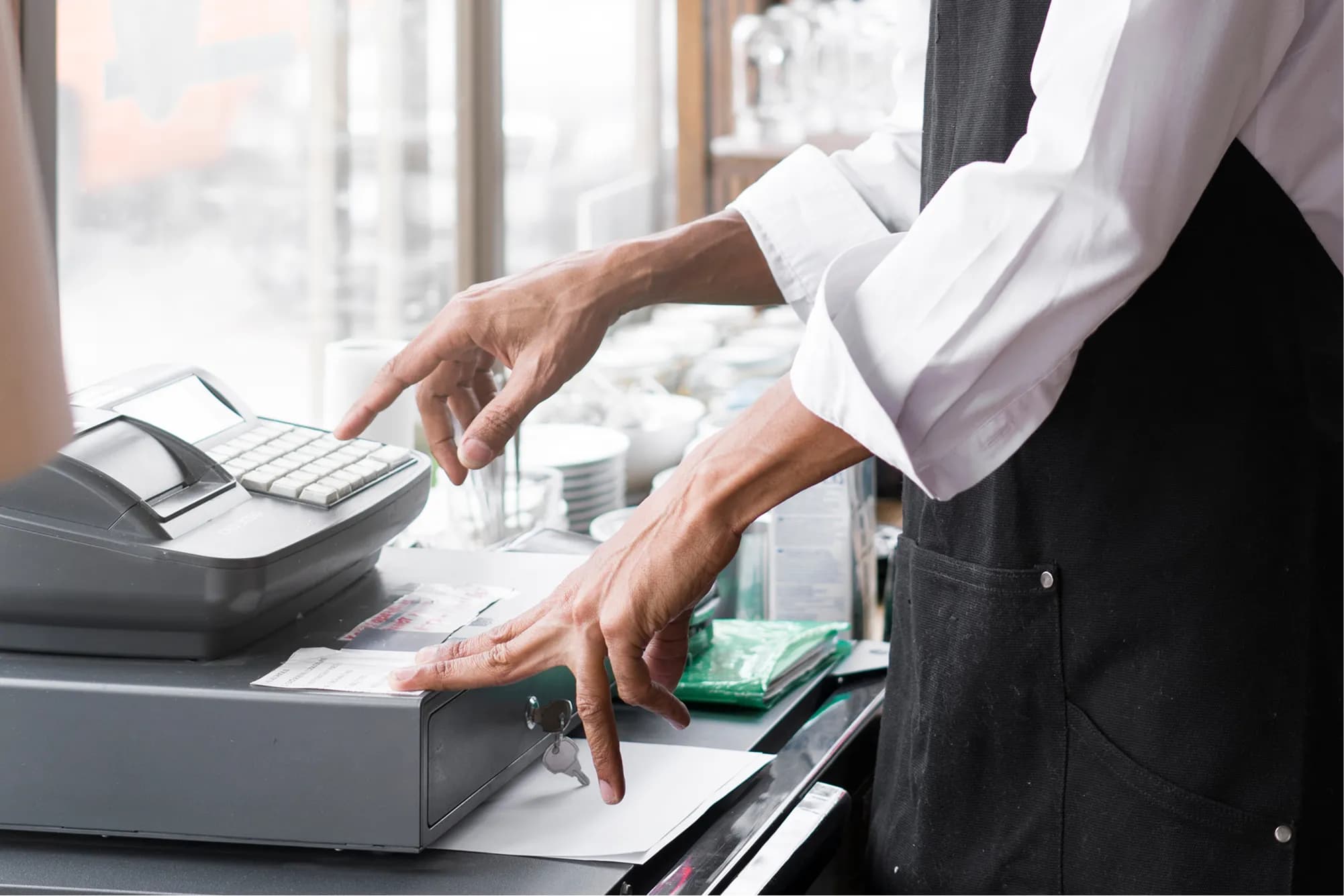 /images/tableService/medium-shot-business-owner-with-cash-register.webp image